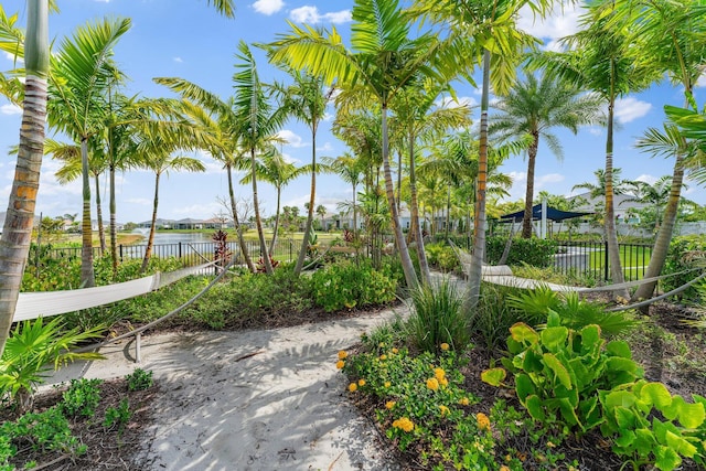 surrounding community featuring a water view