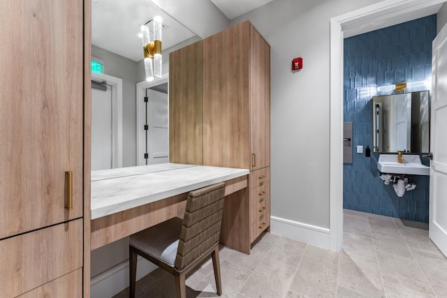 bathroom with sink and tile patterned floors