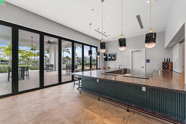 kitchen with visible vents and pendant lighting