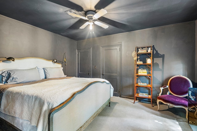 bedroom with ceiling fan and carpet floors