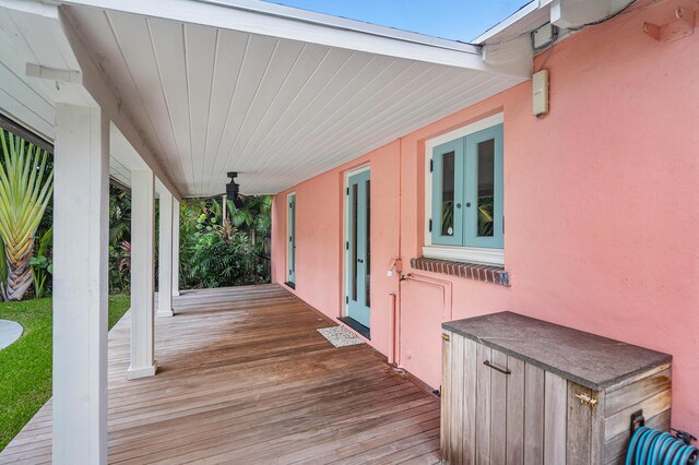 wooden deck featuring french doors