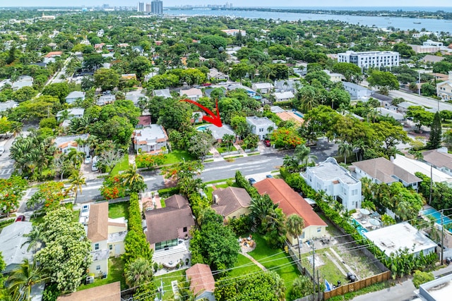 birds eye view of property featuring a water view