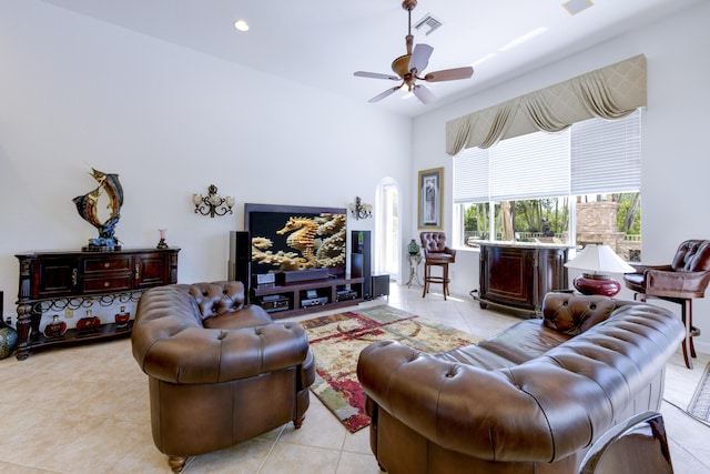 living room with light tile patterned flooring and ceiling fan