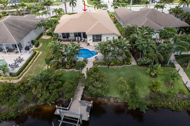 drone / aerial view with a water view