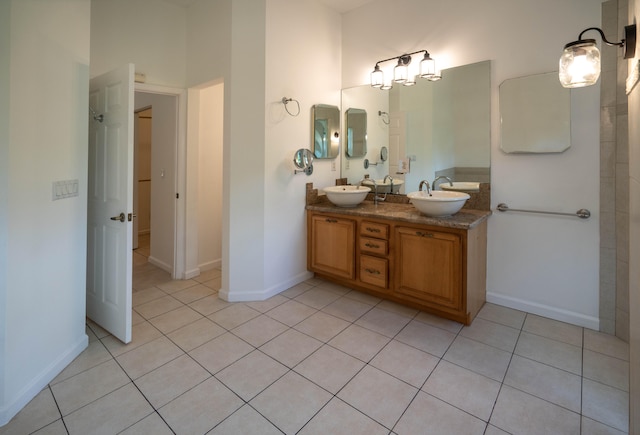 bathroom featuring tile flooring and dual bowl vanity