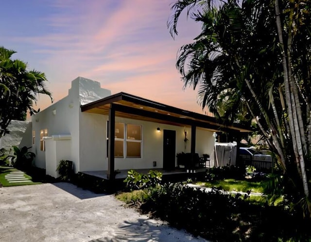 view of front of home featuring a patio