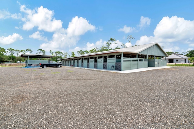 exterior space featuring an outbuilding