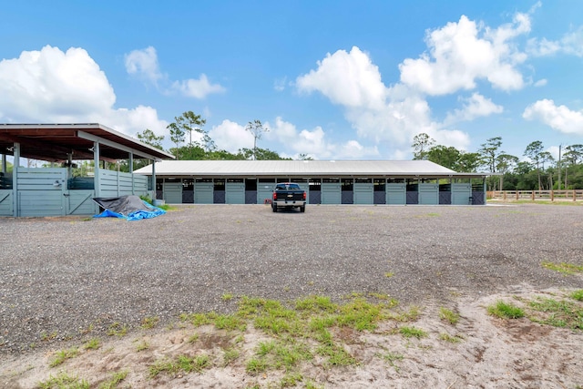 view of front of property with an outdoor structure