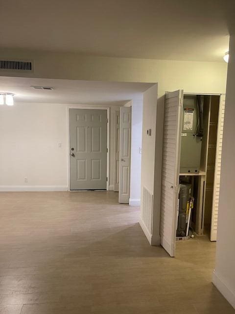 hallway featuring light wood-type flooring