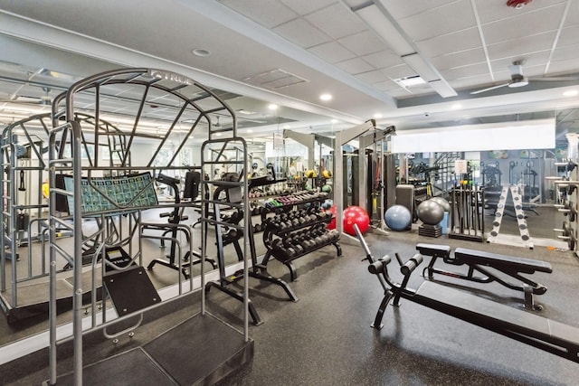 workout area featuring a paneled ceiling