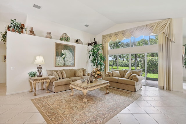 living room featuring light tile patterned flooring and lofted ceiling