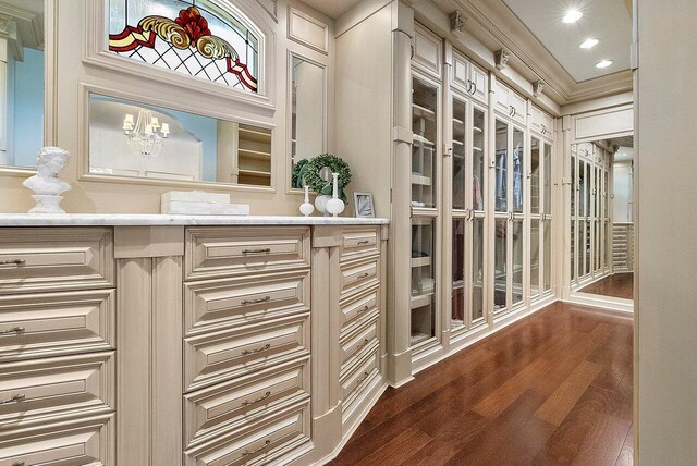 kitchen featuring crown molding and dark hardwood / wood-style floors