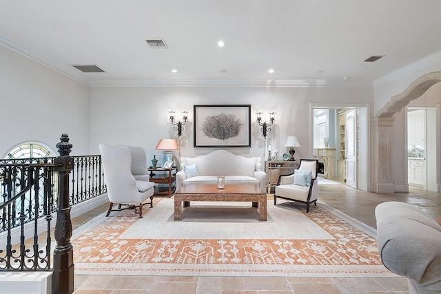 living room with ornamental molding