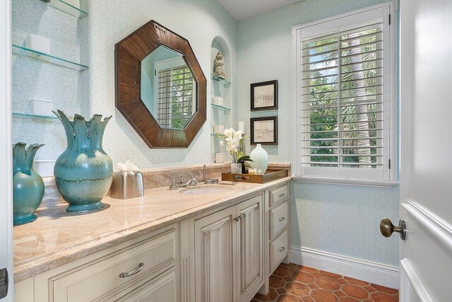 bathroom featuring vanity and tile patterned flooring