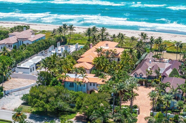 bird's eye view featuring a water view and a view of the beach