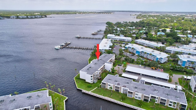 birds eye view of property featuring a water view