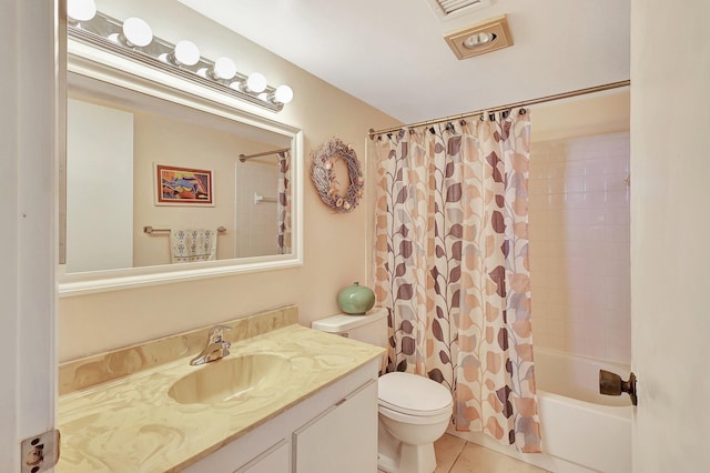 full bathroom featuring toilet, vanity, tile patterned floors, and shower / bath combo with shower curtain