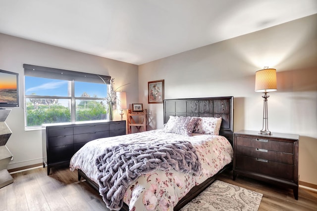 bedroom featuring hardwood / wood-style flooring