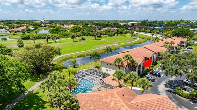 birds eye view of property featuring a water view