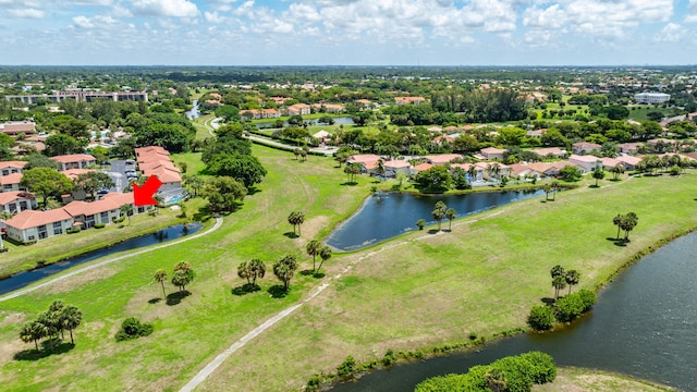 drone / aerial view featuring a water view