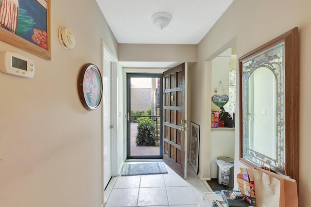 entryway with light tile floors