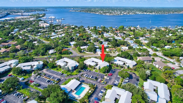 drone / aerial view with a water view