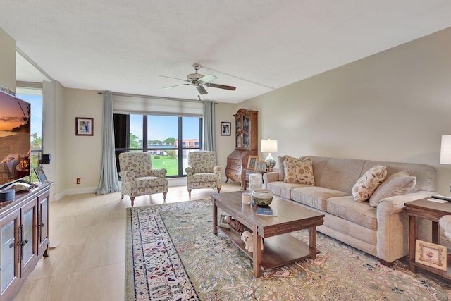 living room featuring ceiling fan