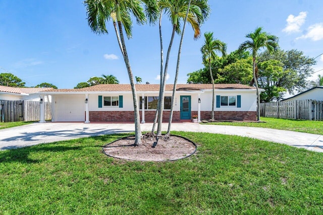 ranch-style home with a garage and a front lawn