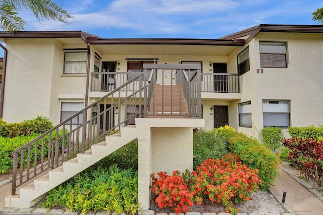 view of building exterior with stairs