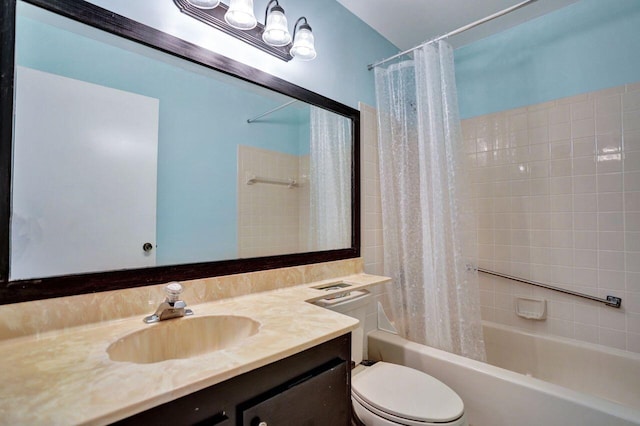 full bathroom with vanity, toilet, and shower / bath combo with shower curtain