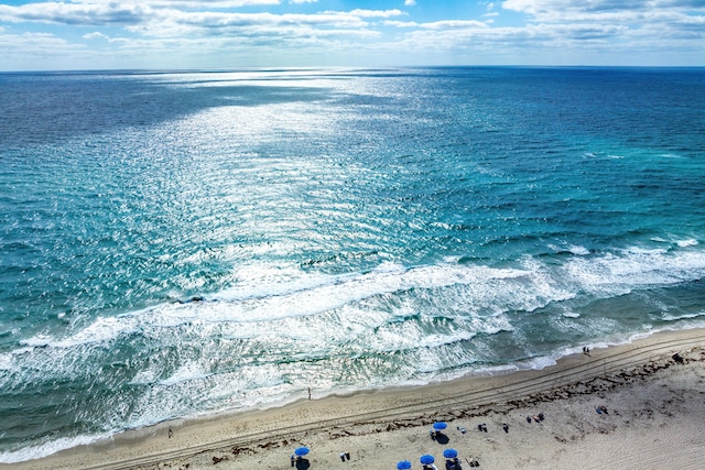 aerial view featuring a beach view and a water view