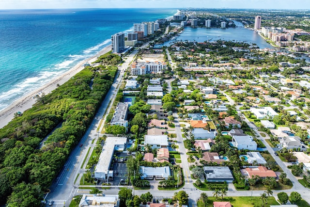 aerial view featuring a water view and a beach view