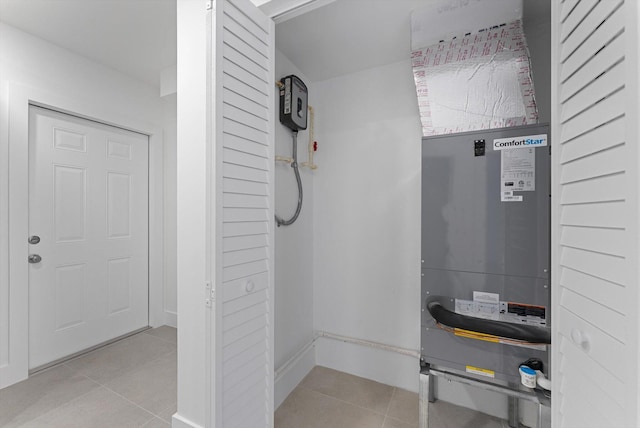 utility room with heating unit