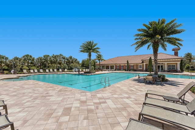 pool with a patio area