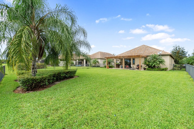 view of yard featuring a patio and a fenced backyard