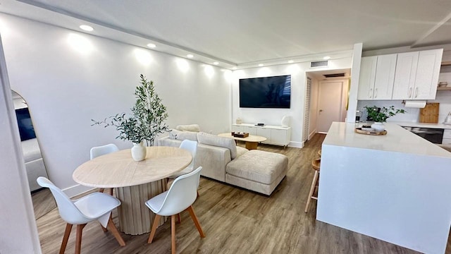 dining area with light wood-type flooring