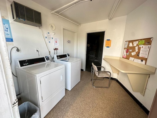 clothes washing area with independent washer and dryer