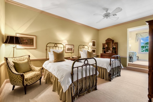 carpeted bedroom with crown molding and ceiling fan