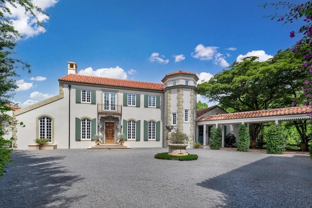 view of property with driveway