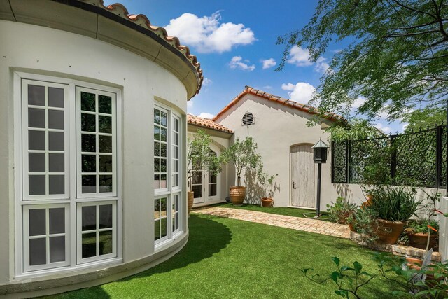 view of yard featuring french doors