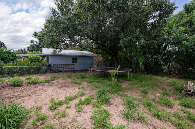 1013 Hispana Ave, Fort Pierce, FL 34982 - view of yard featuring a trampoline