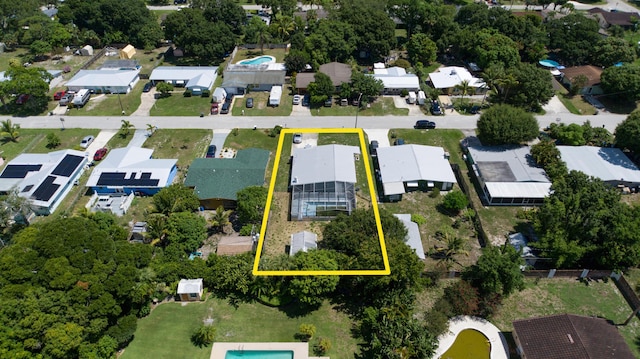 1013 Hispana Ave, Fort Pierce, FL 34982 - aerial perspective of suburban area with property boundaries highlighted