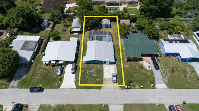 1013 Hispana Ave, Fort Pierce, FL 34982 - aerial perspective of suburban area featuring property parcel outlined