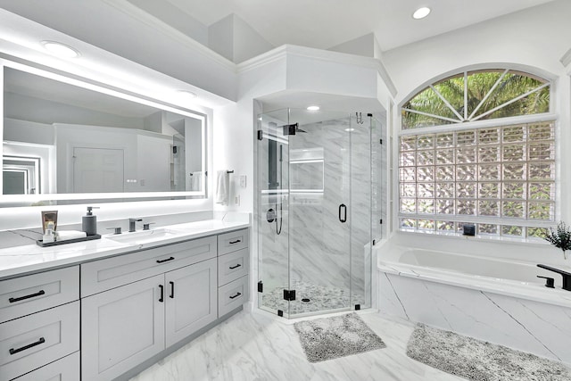 bathroom with shower with separate bathtub, tile patterned floors, and vanity