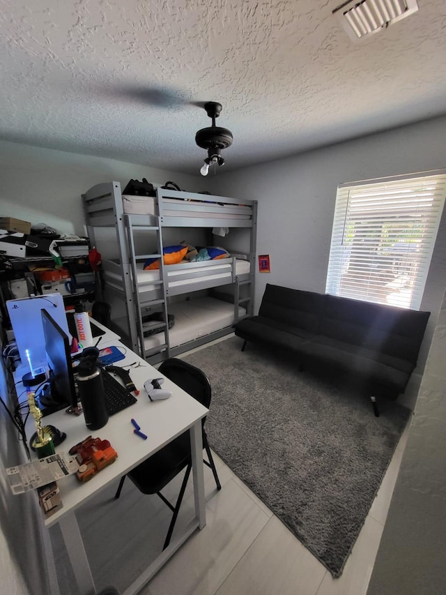 bedroom with a textured ceiling