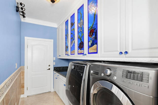 clothes washing area with light tile patterned flooring, cabinets, separate washer and dryer, and crown molding