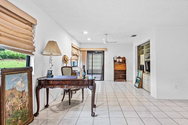 office area featuring ceiling fan and light tile floors