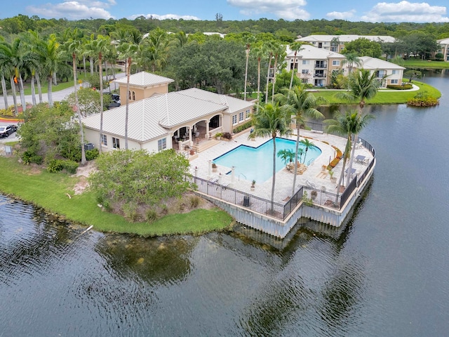 drone / aerial view with a water view