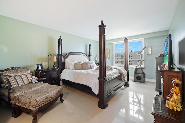 bedroom featuring light tile patterned flooring