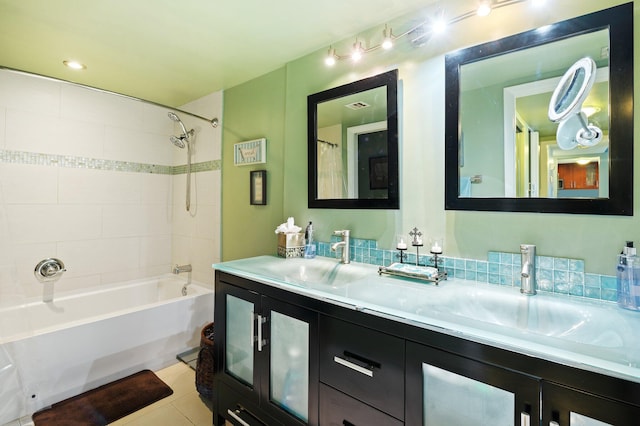 bathroom featuring tile patterned floors, vanity, and shower / bath combo with shower curtain